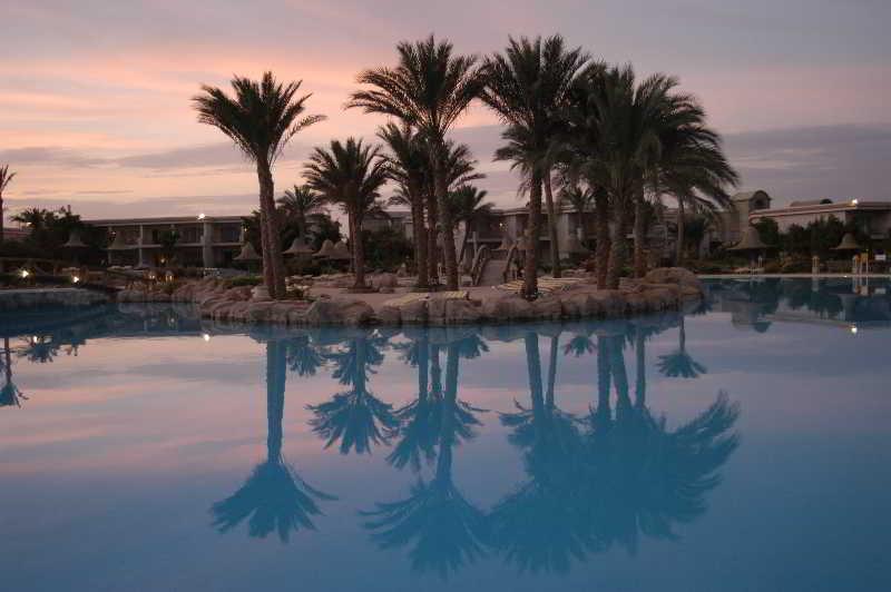 Parrotel Beach Resort Sharm el-Sheikh Exterior photo Sunset at the Hilton Sharm El Sheikh